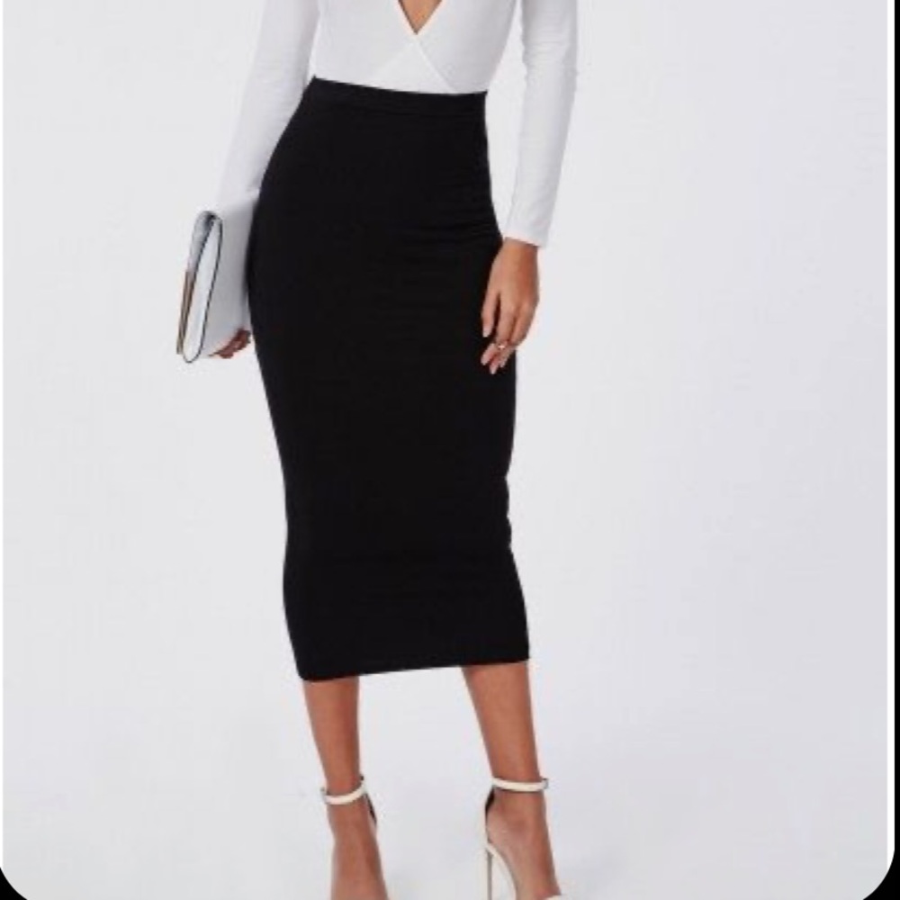 MISGUIDED Jersey pencil skirt. Size IS 8